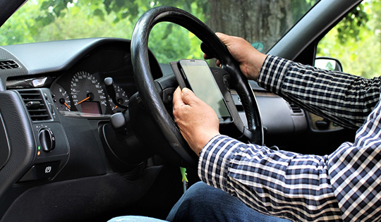 Using your mobile whilst driving – know the law - Gold Coast
